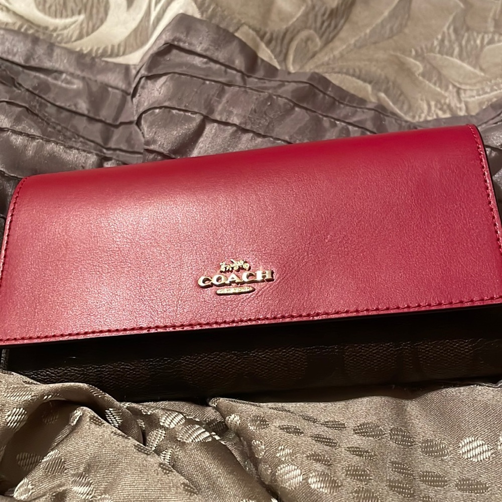 Coach red and brown checkbook wallet. Like new condition.